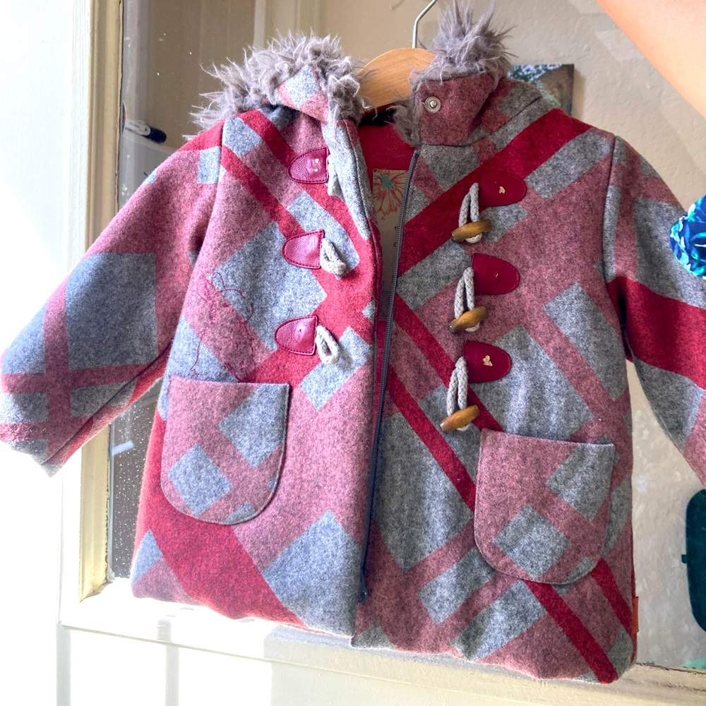 Oilily Red and Gray plaid baby puffer jacket with faux fur-lined hood.